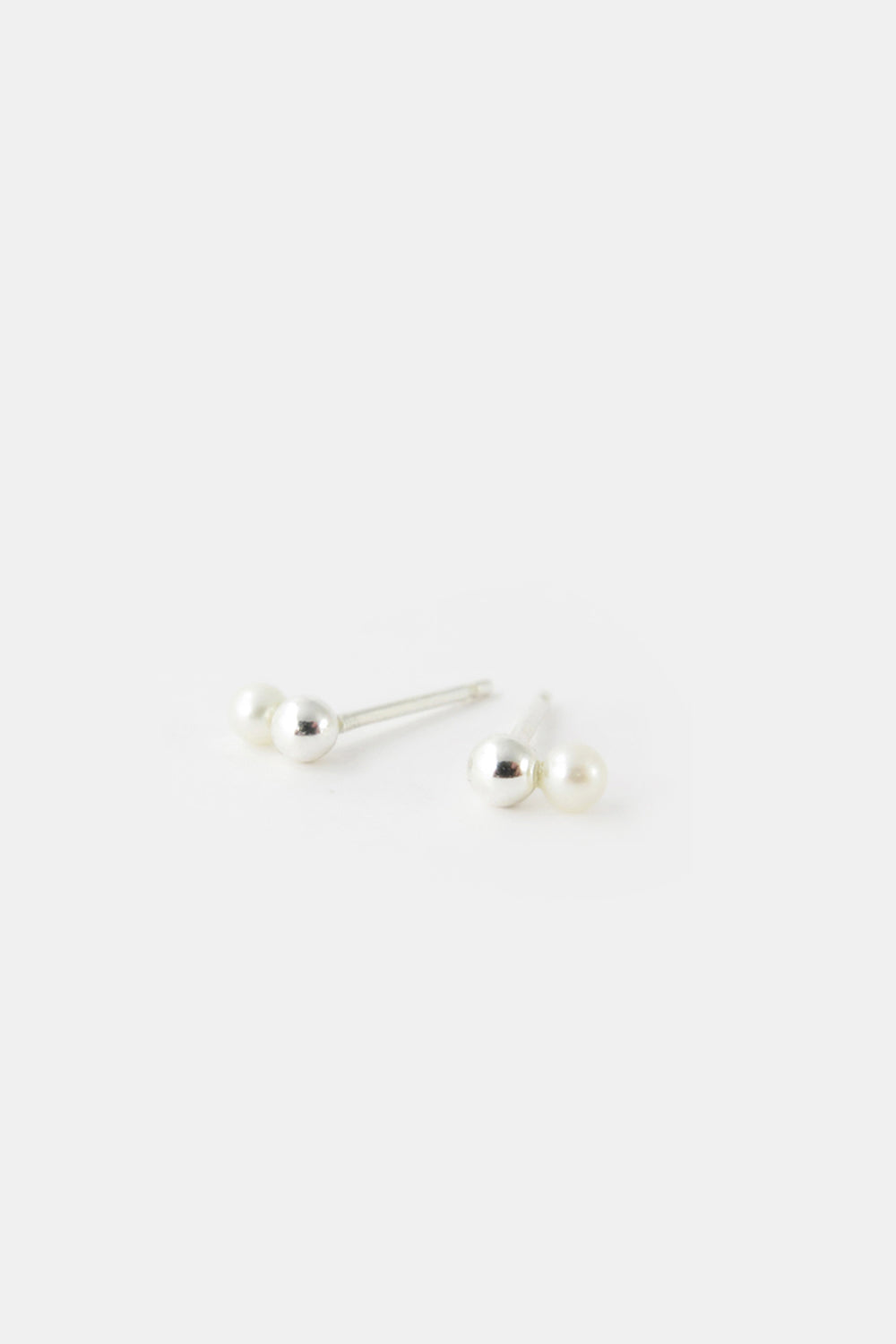 White pearl and ball earrings